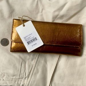 HOBO metallic bronze leather trifold wallet. New with tags